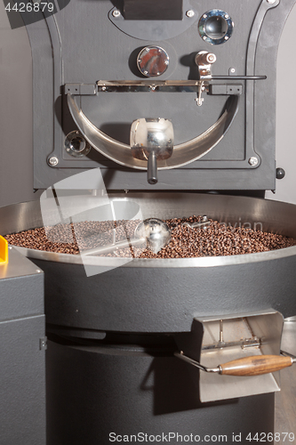 Image of Roasting machine with finished coffee 