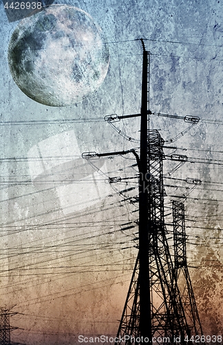 Image of electric power transmission and full moon