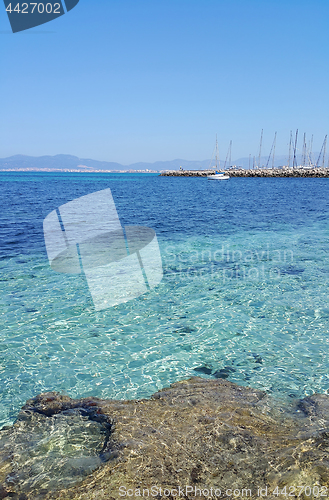 Image of Beautiful sea views with yacht and Palma de Mallorca on the hori