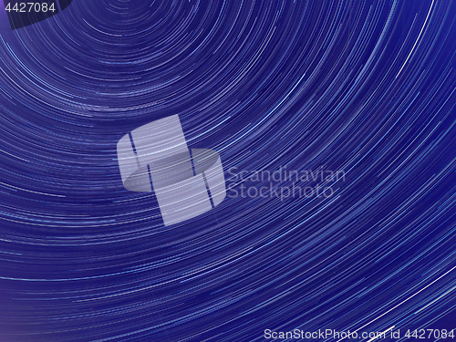 Image of Long exposure image showing Night sky star trails 