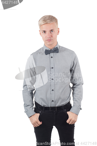 Image of Male in shirt and bow-tie standing