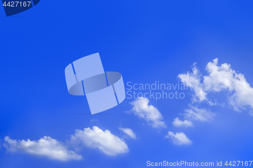 Image of bright blue sky with clouds background