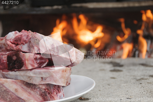 Image of Raw steaks fiorentina-style, ready to be cooked