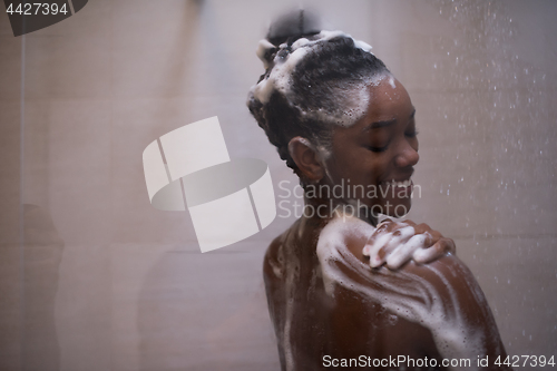 Image of African American woman in the shower