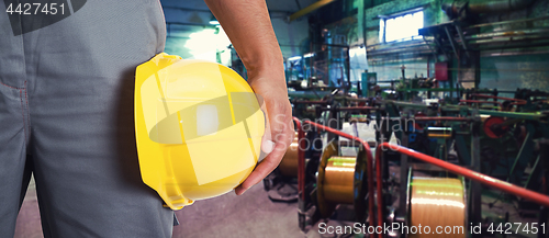 Image of Worker with safety helmet