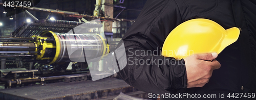 Image of Worker with safety helmet