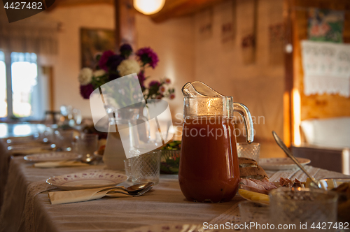 Image of Decorated table with jug of juice