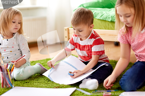 Image of happy creative kids making crafts at home