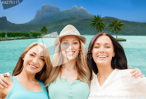 Image of happy women over bora bora background