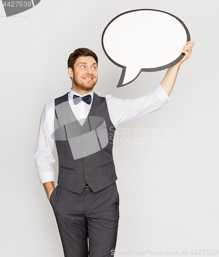 Image of happy man in suit holding blank text bubble banner