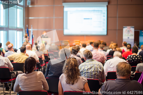 Image of Woman giving presentation on business conference meeting.