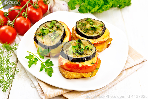 Image of Appetizer of aubergines and cheese on table