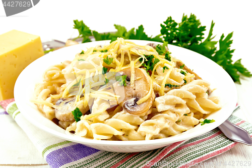 Image of Fusilli with mushrooms on napkin