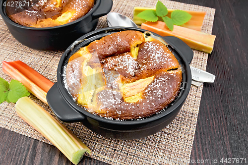 Image of Klafuti with rhubarb in black brazier on dark board