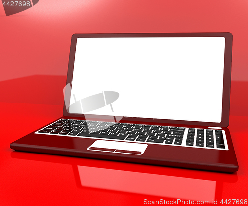 Image of Red Computer On Desk With White Copyspace
