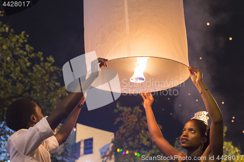 Image of Couple release Chinese lantern