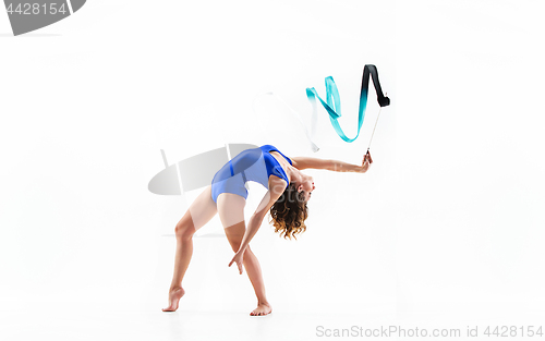 Image of The portrait of beautiful woman gymnast on white