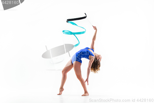 Image of The portrait of beautiful woman gymnast on white