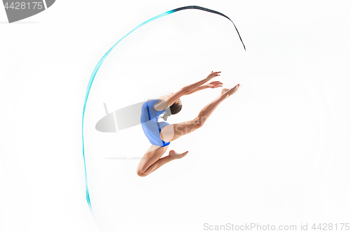 Image of The portrait of beautiful woman gymnast on white