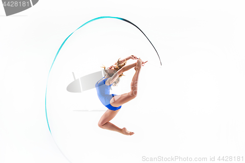 Image of The portrait of beautiful woman gymnast on white