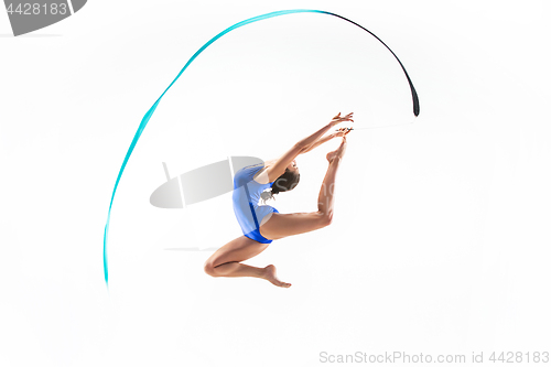 Image of The portrait of beautiful woman gymnast on white