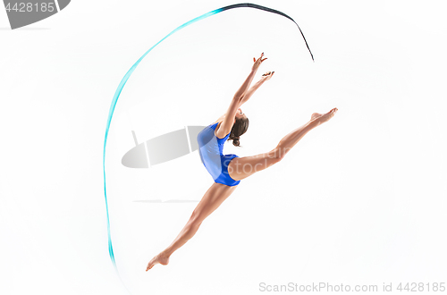 Image of The portrait of beautiful woman gymnast on white