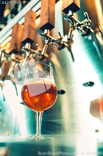 Image of Beer taps in a pub