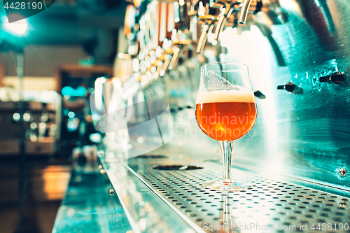 Image of Beer taps in a pub