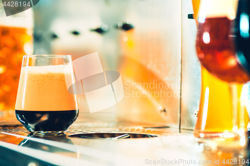 Image of Beer taps in a pub