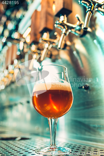 Image of Beer taps in a pub