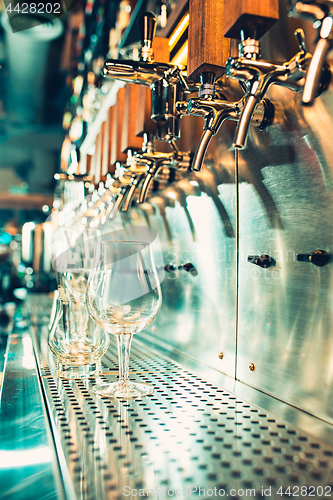 Image of Beer taps in a pub