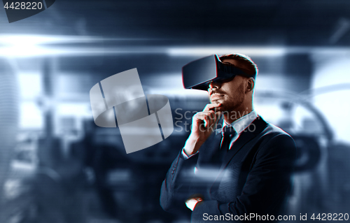 Image of businessman in virtual reality headset