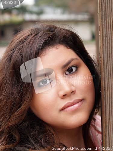 Image of pretty plus-size model portrait outdoors neutral