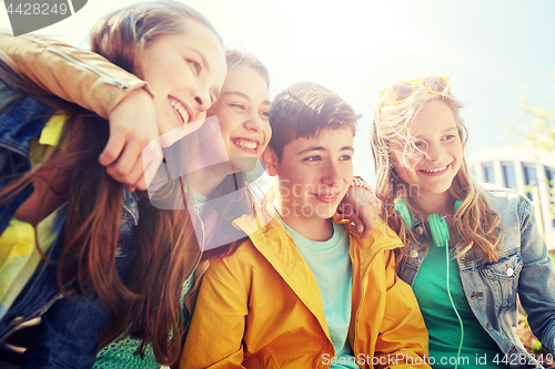 Image of happy teenage students or friends outdoors