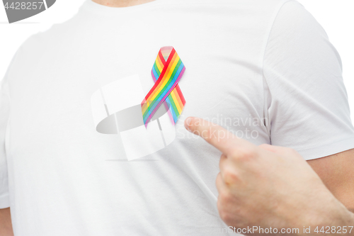 Image of man with gay pride rainbow awareness ribbon