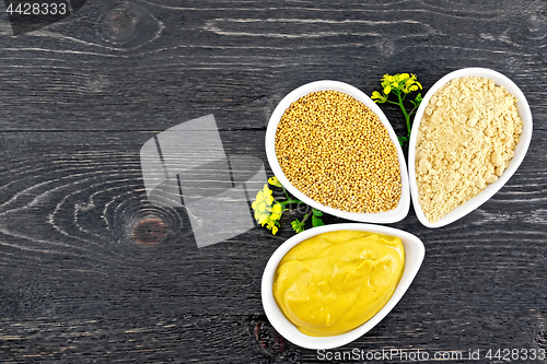 Image of Mustard different in bowls with flower on board