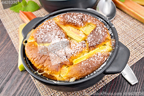 Image of Klafuti with rhubarb in brazier on wooden board