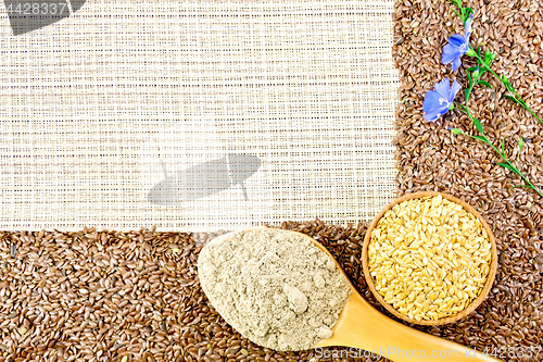 Image of Flour and flax seeds on coarse woven fabric