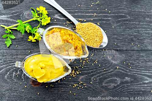 Image of Sauce mustard in two sauceboats with flower on board top