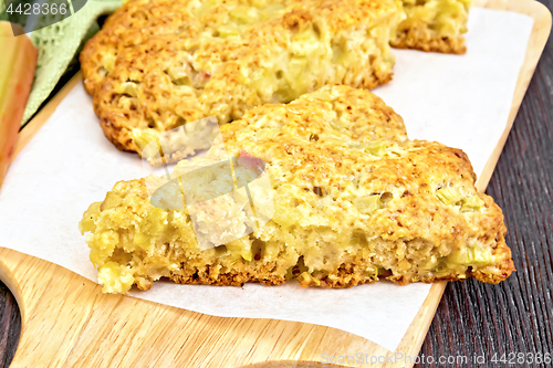 Image of Scones with rhubarb on wooden table