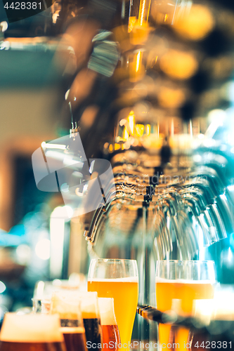 Image of Beer taps in a pub