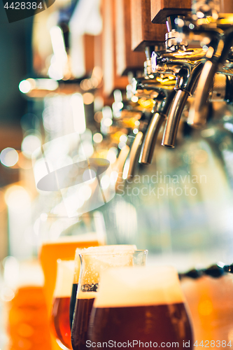 Image of Beer taps in a pub