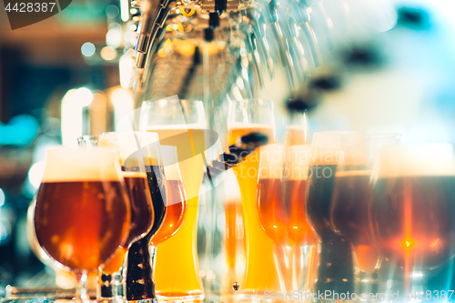 Image of Beer taps in a pub