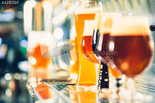 Image of Beer taps in a pub