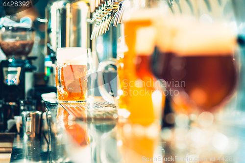 Image of Beer taps in a pub