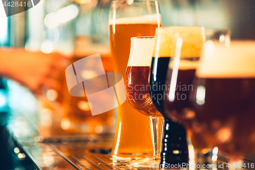 Image of Beer taps in a pub