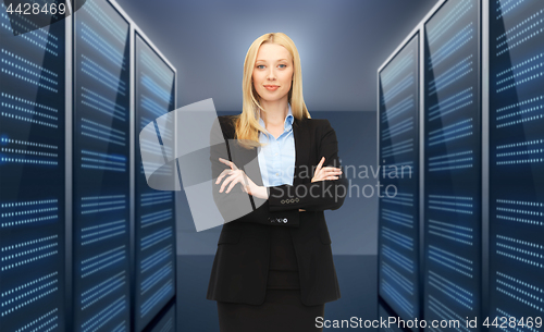 Image of businesswoman or admin over server room background