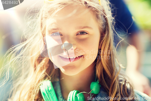 Image of happy teenage girl with headphones