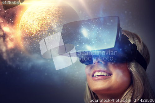 Image of woman in virtual reality headset or 3d glasses