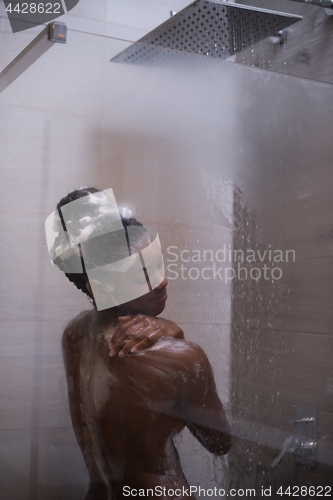 Image of African American woman in the shower